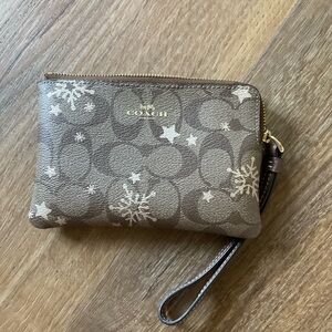 Coach Tan Wristlet with Snowflake Pattern